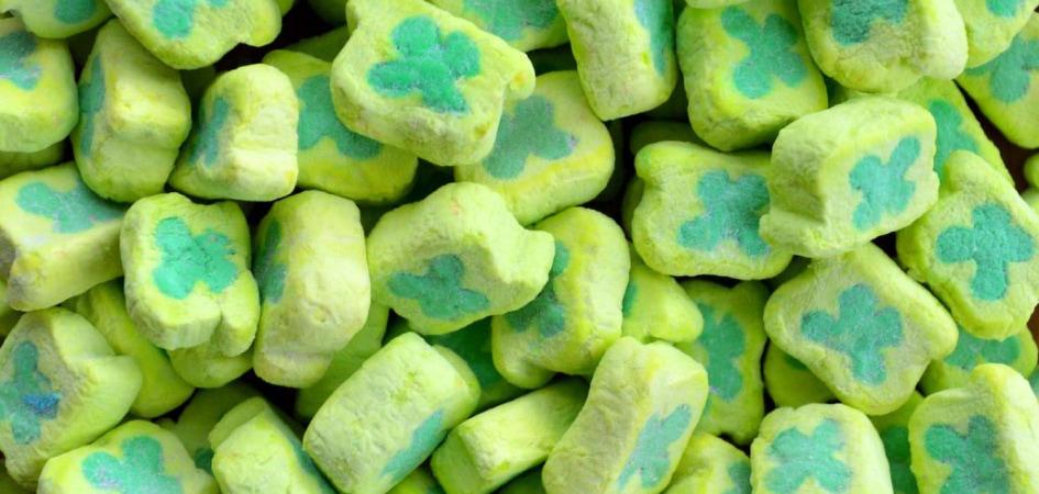 A pile of Lucky Charms green clover marshmallow pieces