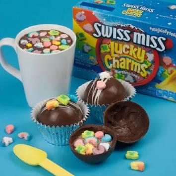 Instagram post featuring Swiss Miss Lucky Charms™ Hot Chocolate Bombs. - Link to social post